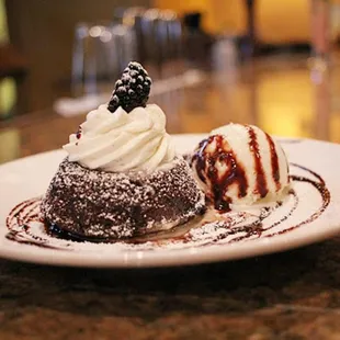 a desert with ice cream and chocolate sauce