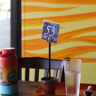 Cute pot that holds order numbers