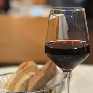 a glass of wine and bread