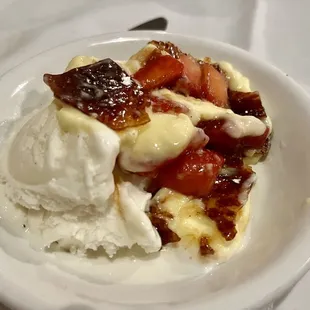 Crème Brûlée, strawberries and Vanilla Ice cream. Yummy!