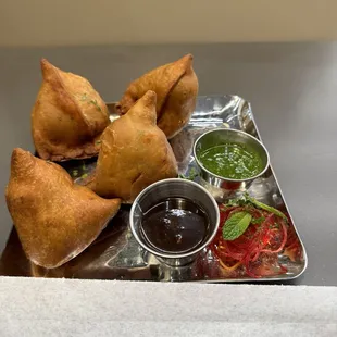 Samosa are huge. Just get one order that includes 2 piece first. I under estimated the size!!