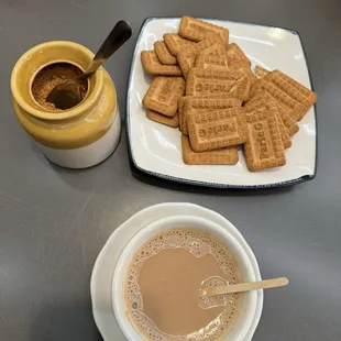 Chai with jaggerdy and cookies