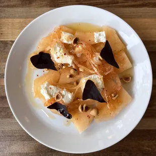 Rocky Ford cantaloupe with local chevre, pickled onions and toasted hazelnuts