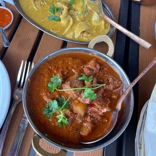 Lamb vindaloo and chicken masala.