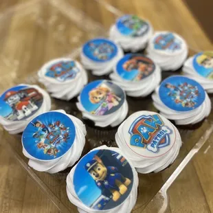 a tray of paw patrol cupcakes