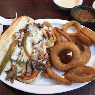 Philly Cheesesteak - usually comes with fries