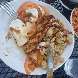 Where is the basil in this caprese dish...3 tiny slivers. And bagged pasta...even though they have housemade pasta?