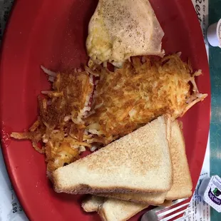 One egg with extra crispy hash browns and toast