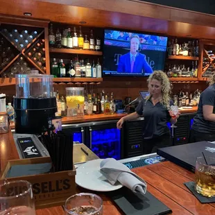 a bar with a television