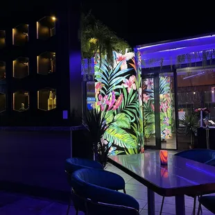 a table and chairs in a restaurant