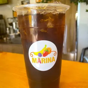 a cold drink in a plastic cup