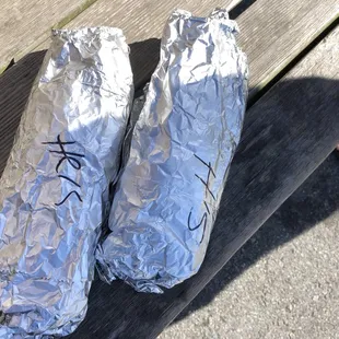 His and hers giant burritos! Bacon, egg, avocado, spinach on whole wheat in one. Bacon, egg, avocado and mixed veggies in other!