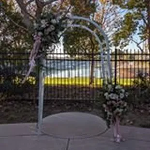 I LOVE the view for the patio wedding!! This is their arch that we used, my aunt was my florist.