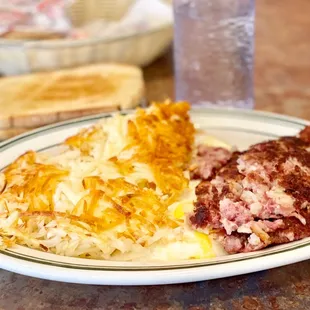 Corned Beef Hash, 2 Eggs and Hash Browns with Rye Toast