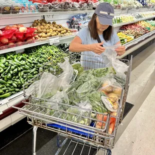 a woman shopping in a grocery store