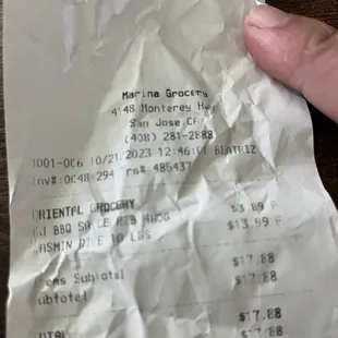 a person holding a receipt