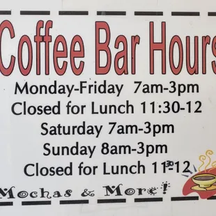 a sign for coffee bar hours