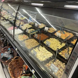 a variety of food items in a display case