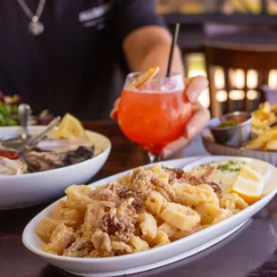 Fritto Misto and a lovely cocktail by the waterfront.