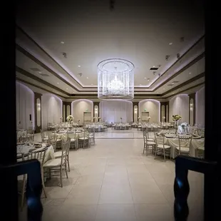 With over 12,000+ Austrian Cystals suspended from above, we can't help but take a peak every now and then! Contact us to schedule a tour!