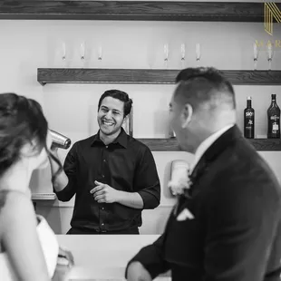It's guaranteed to be a great night when the bride and groom are caught at the bar