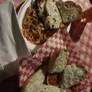 Chicken Parmesan on Fettucine and garlic cheesy bread