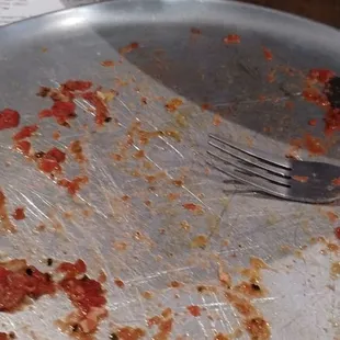 Too bad the server washes the floor and touches plates without washing his hands, pizza is really good, especially the Sicilian crust.