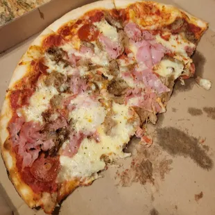 18 inch meat pizza. 22 and change after tax. Decent, but coulda baked it longer.