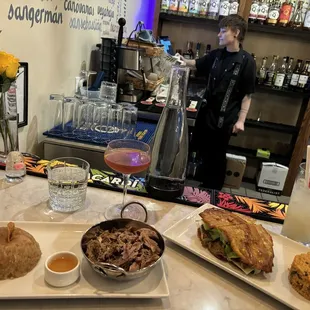 Lechon Asado (left) and Bistec Encebollado (right)