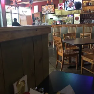 The cook watching tv after I placed my order.