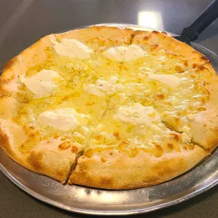 Bianca pizza (no spinach)... tons of garlic and cheese! YUM!
