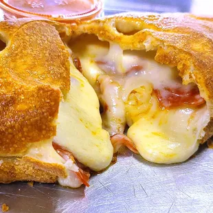 Closeup on the delicious pepperoni stromboli I had