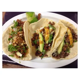 three tacos on a plate