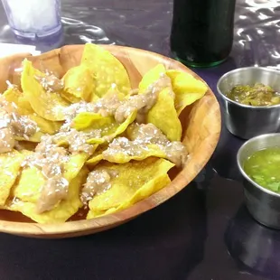 They give you homemade tortilla chips with beans when you eat in