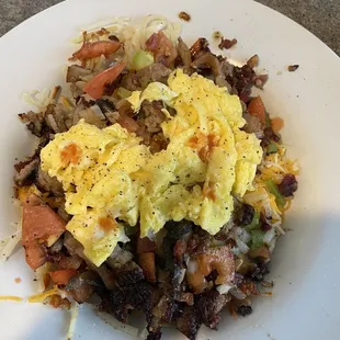 Veggie skillet with bacon and sausage.