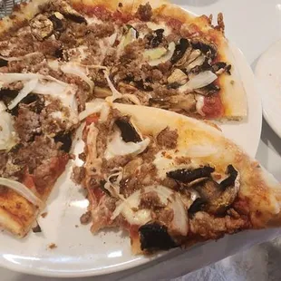 Pizza with mushrooms, onions, and olives. Holly was our server, she is awesome! Very authentic food.
