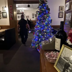 Waiting area for to go orders and adjoining dining space .