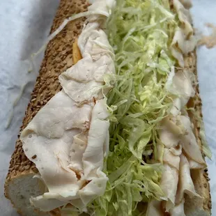 Addy&apos;s Hot Chicken Hoagie Cold Sandwich - Buffalo cheddar, sriracha mayo, fried cold sliced chicken lunch meat on a seeded roll
