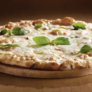 a pizza on a wooden board