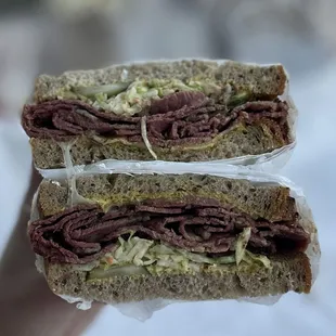 PASTRAMI ON RYE: mustard, pickles, cole slaw &amp; swiss cheese | $15