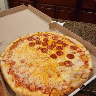 Half cheese/ half pepperoni pizza.  One slice barely had any pepperoni and one slice a had a few.. a bit disappointed on it