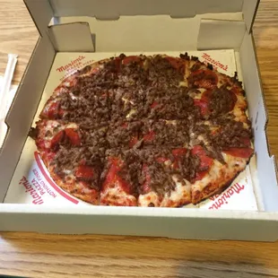 a pizza in a pizza box