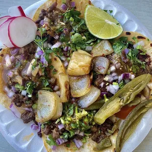 Tacos de asada, carnitas and al pastor. All good!