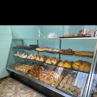 a display case full of pastries