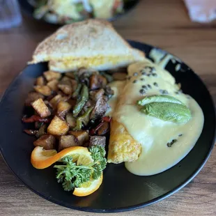 Pacific Omelet and Salmon Benedict. Yum! The potatoes are golden, the avocados are fresh.