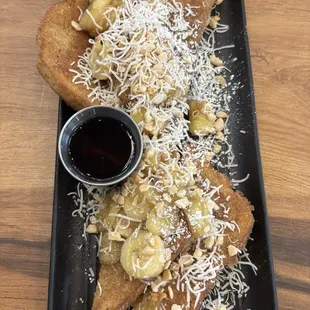Half order of Maui French Toast. Yum!! I asked for no caramel sauce.