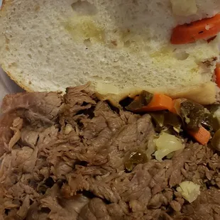 The half that sat in the car for an hour doesn't have enough Au Jus to stain the inner bread, this is dipped ?.