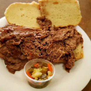 The dipped Italian beef sandwich, notice the inside of the bread, only  the whole bun was dipped so the inside is dry.