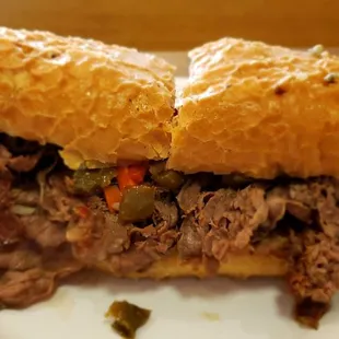 The very dry Italian beef dipped, only the whole bun is dipped then sliced and filled with Italian beef so it's dry.