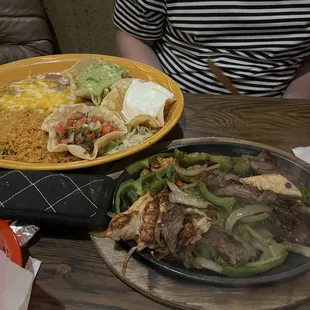 A huge chicken and steak fajita meal! incredible flavor on the chicken. Only 22 bucks!